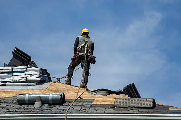 Professional Roofing technician working in Charlton Depot, MA